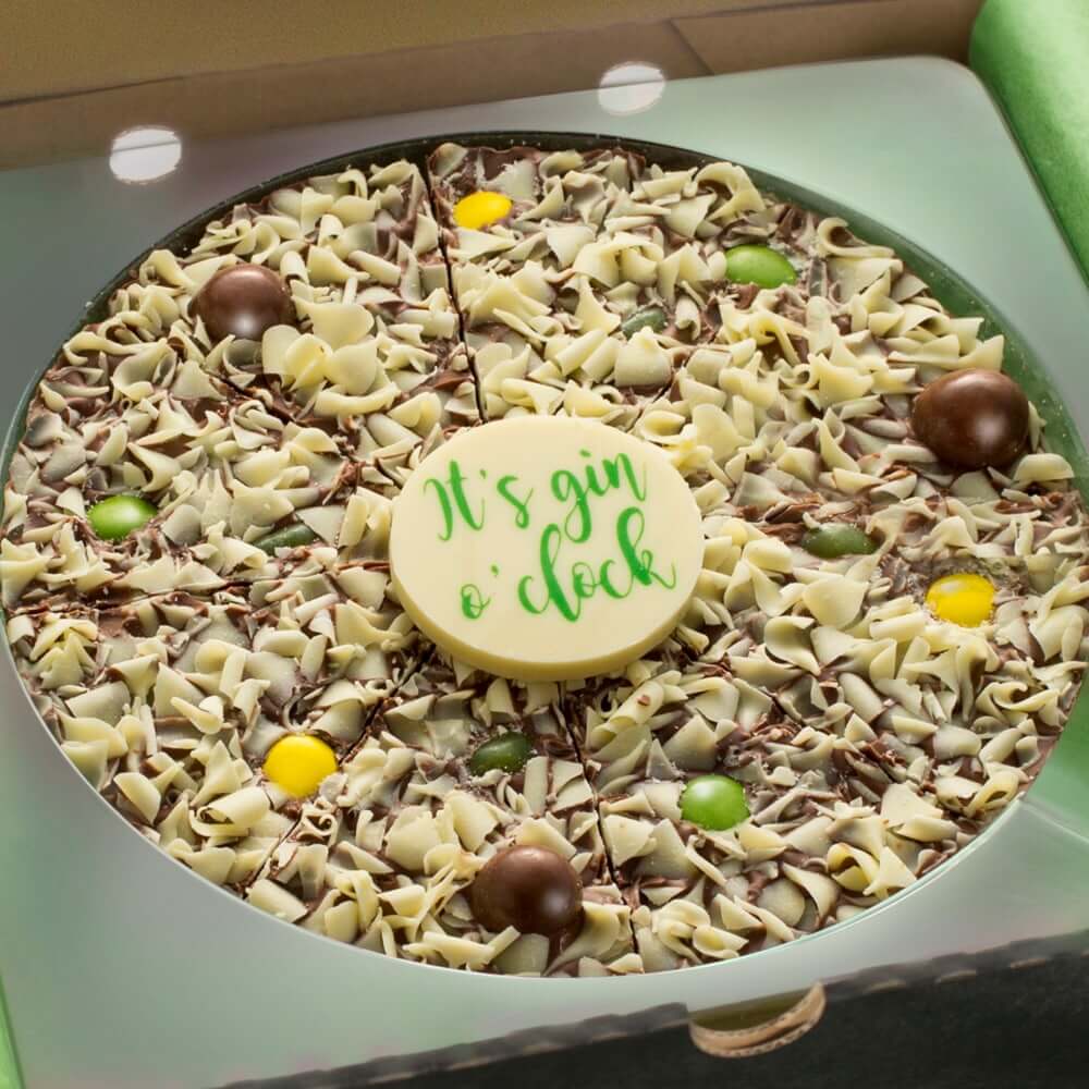 Gin& Tonic Chocolate Pizza featuring white chocolate 'It's Gin O'Clock' plaque